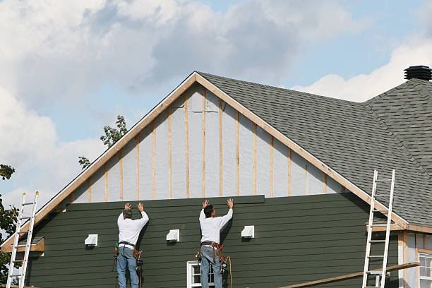Professional Siding technician working in Southborough, MA
